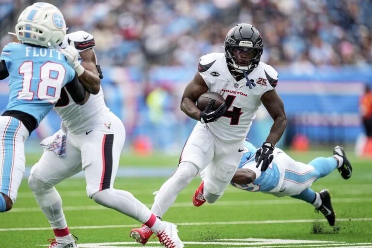 Woody Marks carries the ball for Houston against Tennessee on October 11, 2026.