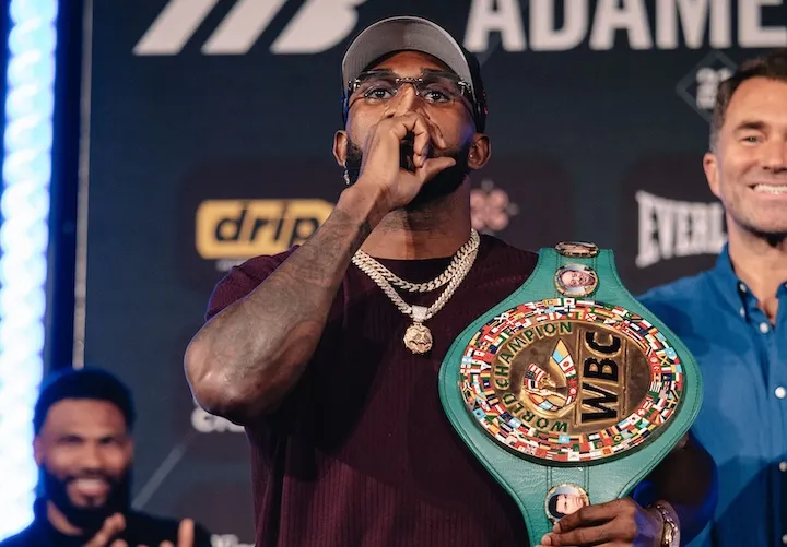 Adames speaks while holding his WBC championship belt.