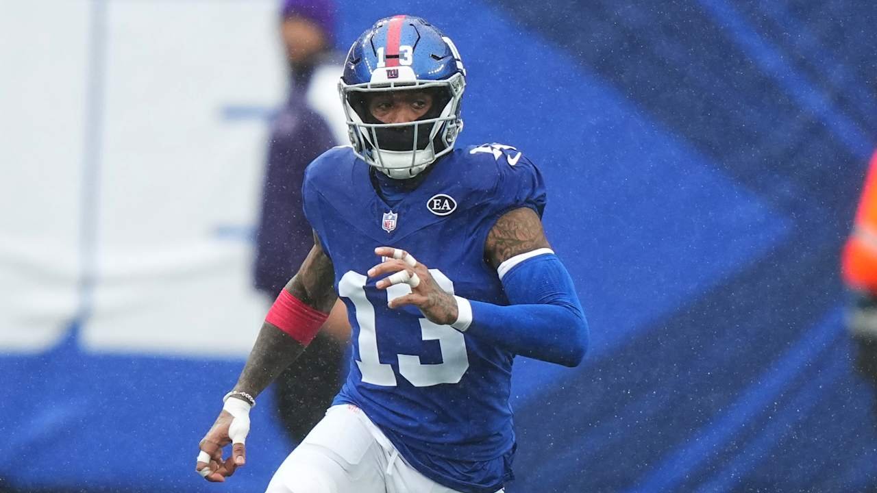 Odell Beckham Jr. running in a blue New York Giants uniform.
