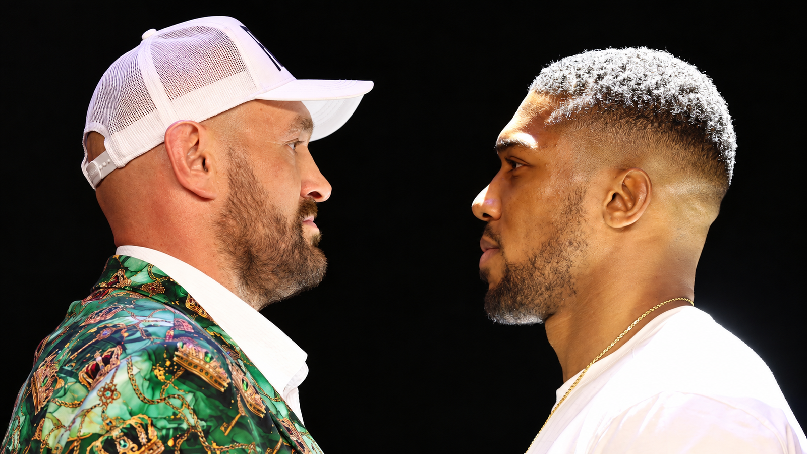 Tyson Fury and Anthony Joshua face each other in a photo-based illustration of their September 30, 2026 fight-launch appearance.