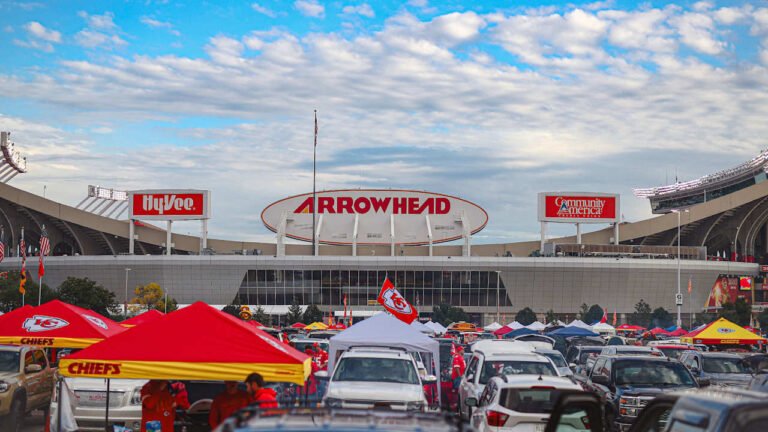 Fans tailgate in the parking lot outside Arrowhead Stadium in Kansas City, Missouri.