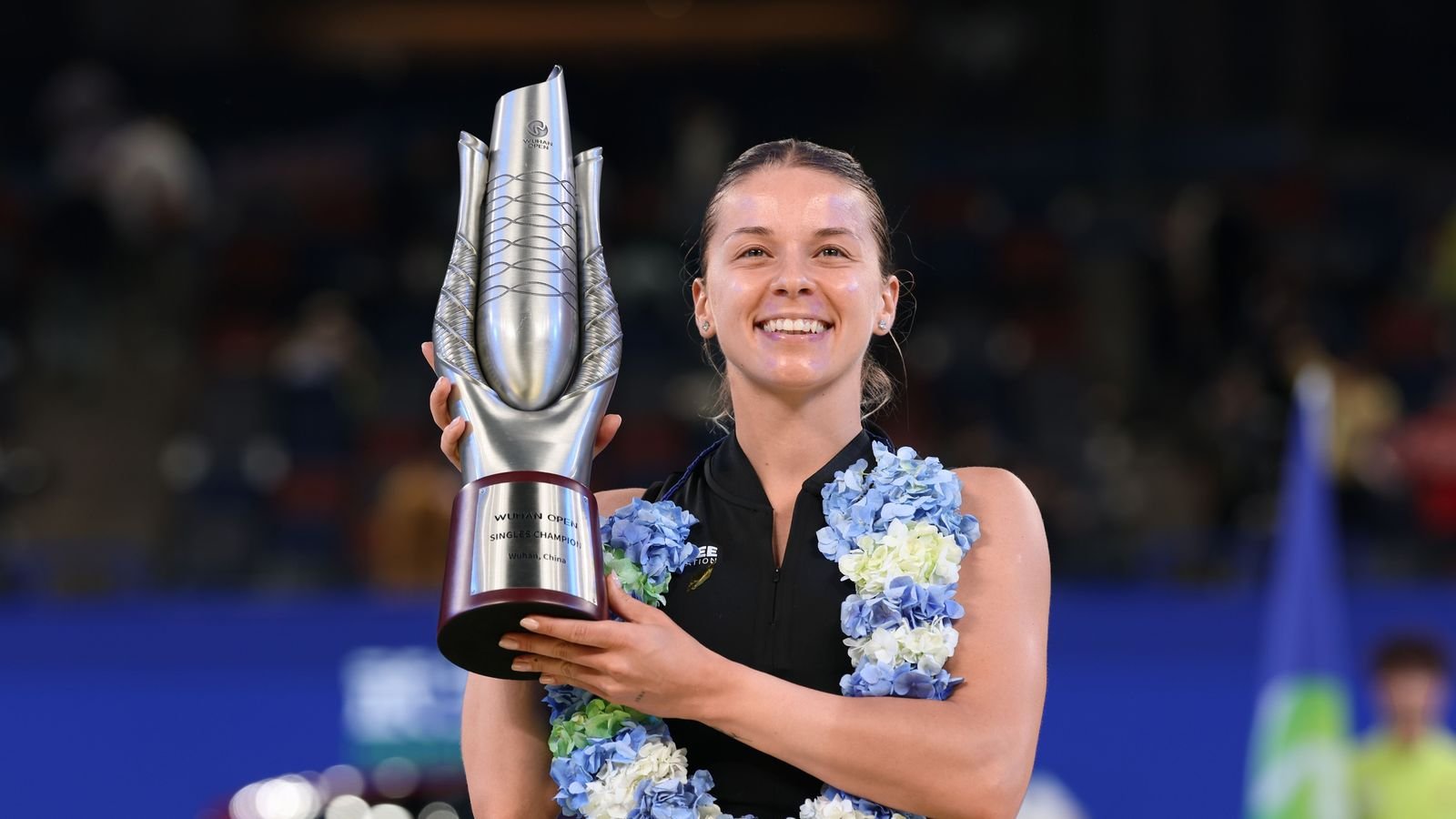 Maja Chwalinska holds the singles trophy at the 2026 Wuhan Open.
