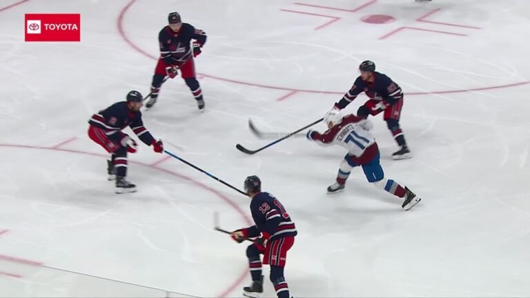 Jaden Schwartz shoots between defenders during Colorado’s October 7 game at Winnipeg