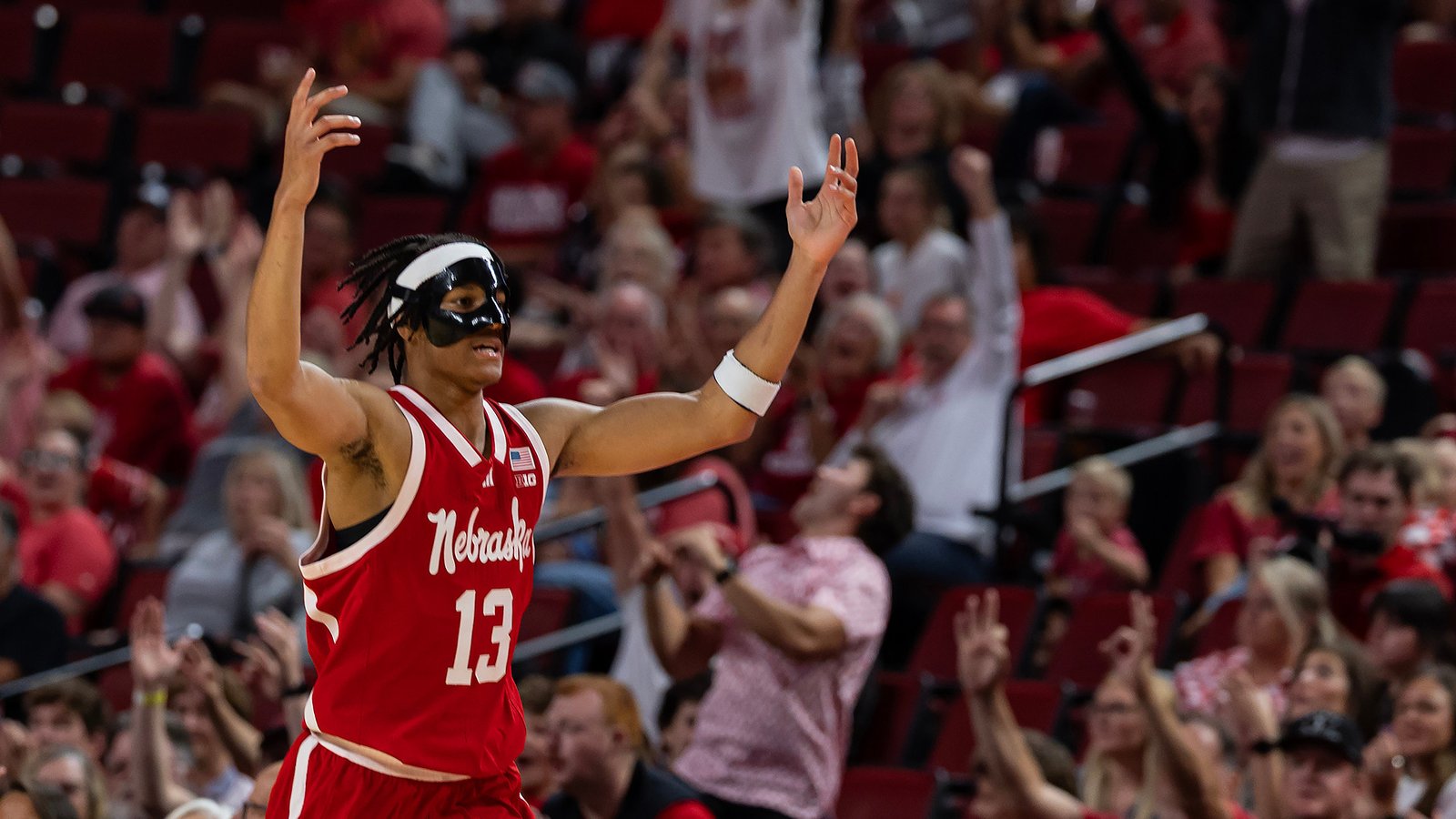 Nebraska guard Jacob Lanier raises both arms during the October9 Saint Louis exhibition