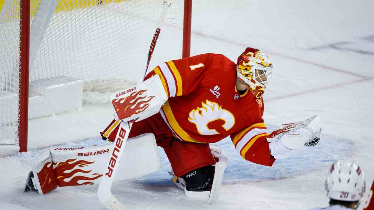 Devin Cooley in Calgary’s goal.