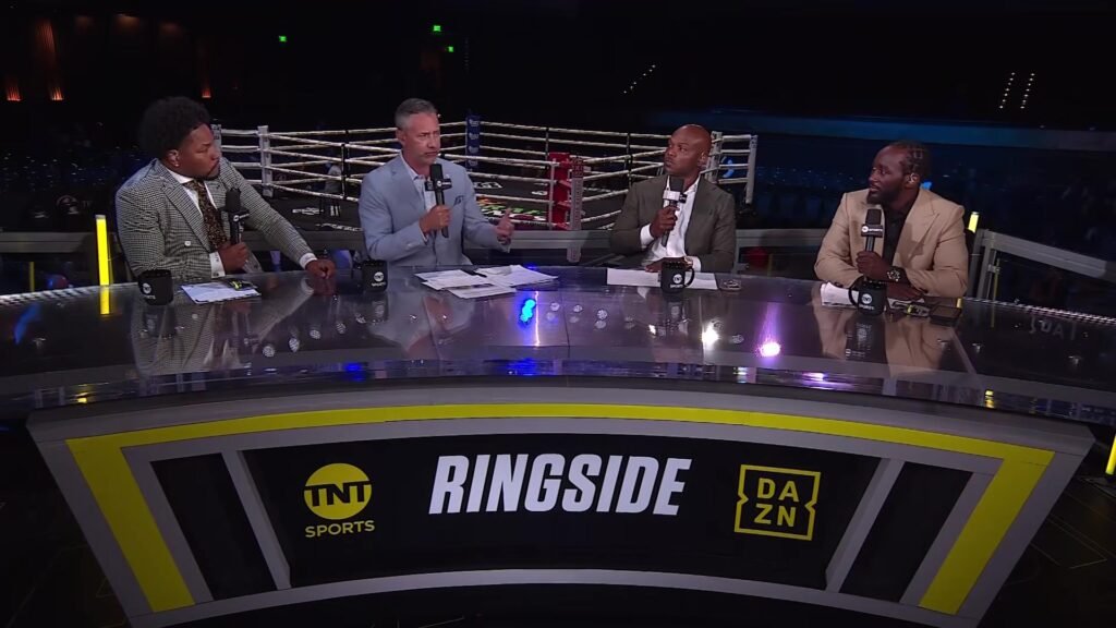 Four The Fight presenters at a ringside desk branded TNT Sports and DAZN.