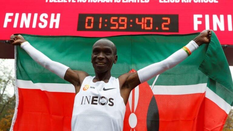 Eliud Kipchoge celebrates his sub-two-hour marathon in Vienna.