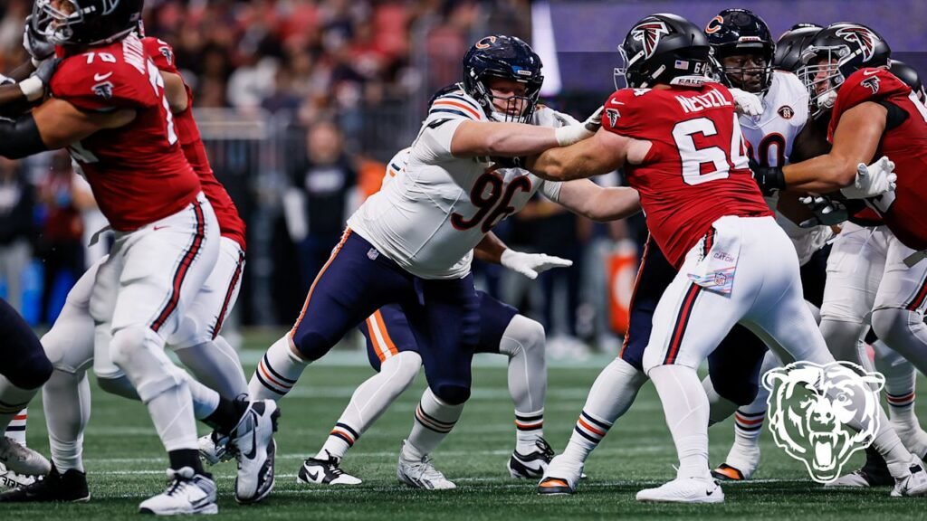 Falcons center Ryan Neuzil blocks a Bears defender.