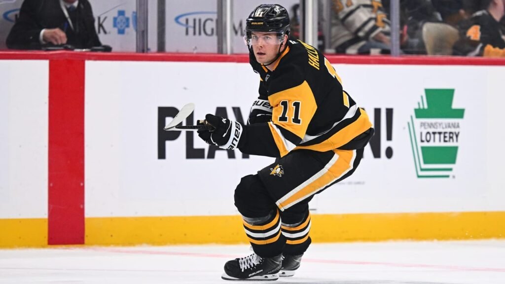 Filip Hallander skating in a Pittsburgh Penguins uniform
