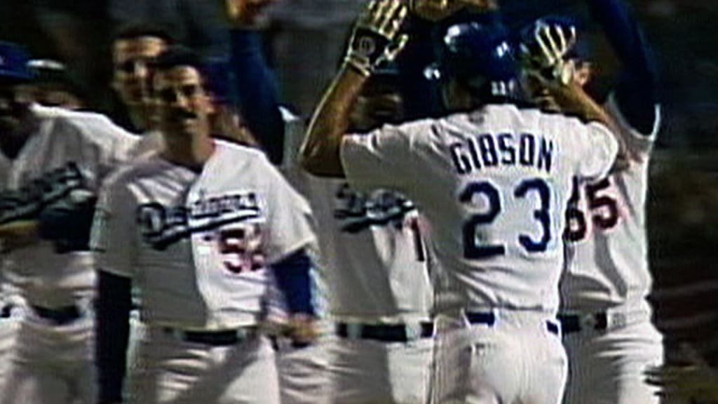 Kirk Gibson celebrates with Dodgers teammates after his 1988 World Series Game 1 home run.