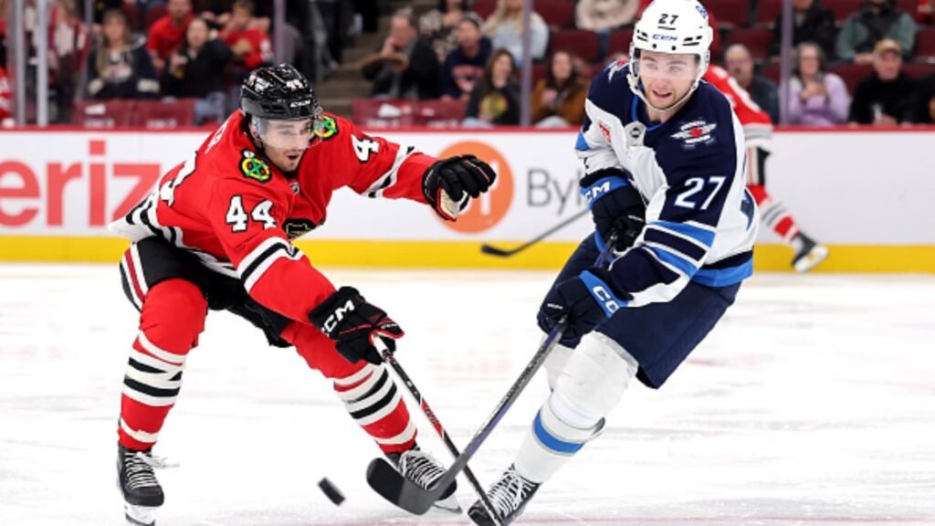 Winnipeg and Chicago skaters contest the puck during their October 15, 2026 game.
