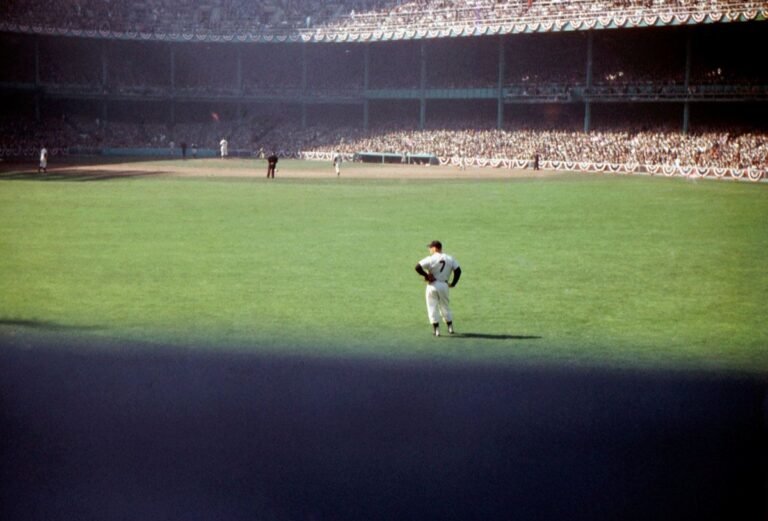 Mickey Mantle stands in center field at Yankee Stadium during Game 5 of the 1956 World Series.