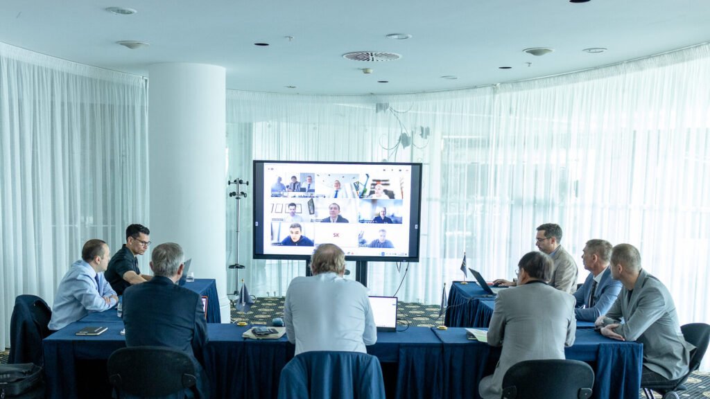 World Boxing officials meet around tables with remote participants on a screen in Budva.