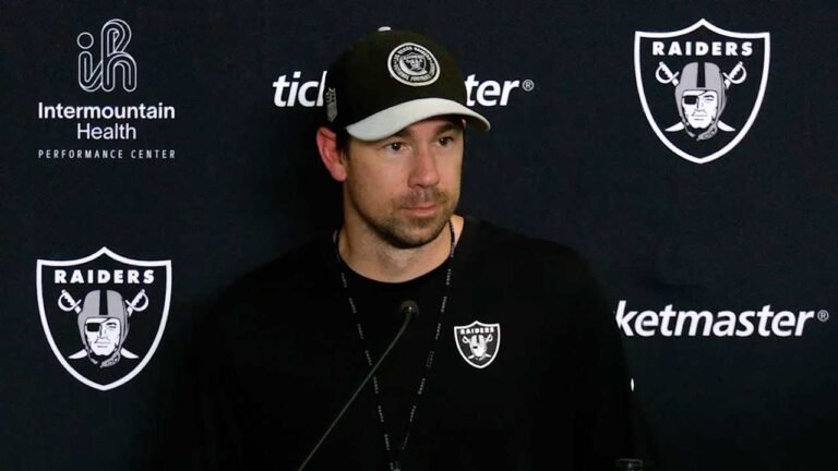 Raiders coach Klint Kubiak speaks at a news conference.