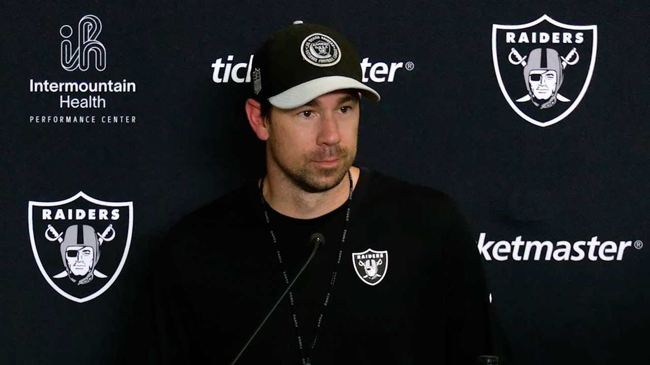 Raiders coach Klint Kubiak speaks at a news conference.