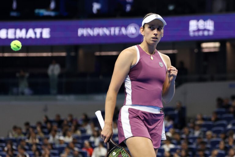 Elise Mertens reacting with her fist raised during her China Open quarterfinal