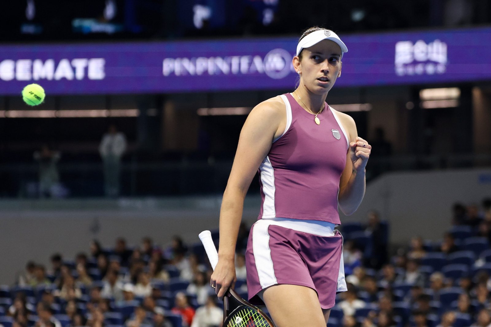 Elise Mertens reacting with her fist raised during her China Open quarterfinal