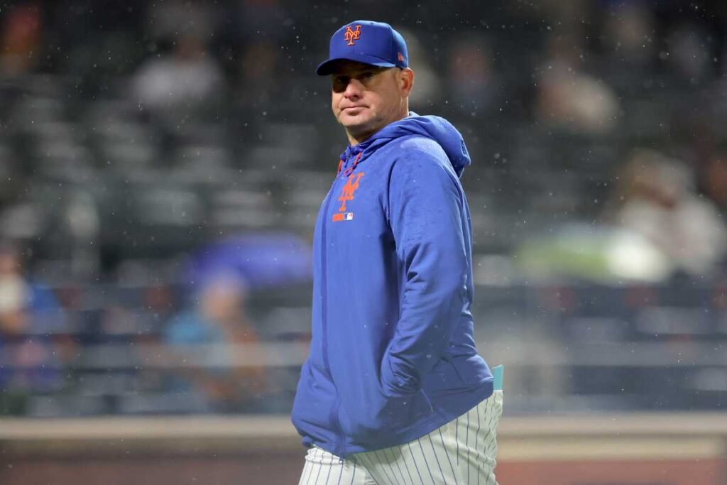 Carlos Mendoza walks off the field during a Mets game at Citi Field.