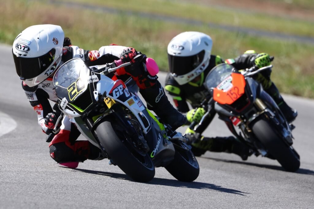Martina Cardenas and Tommy Molnar racing MotoMini motorcycles at Shannonville