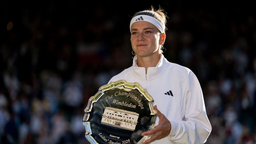 Karolina Muchova holds the Wimbledon 2026 ladies’ singles runner-up trophy on Centre Court