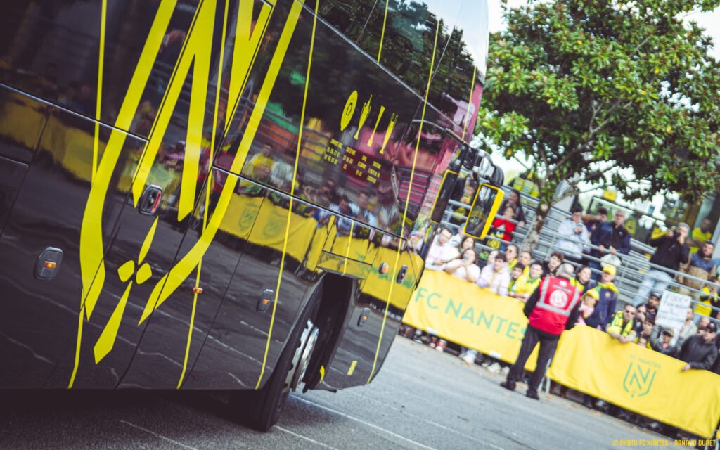 FC Nantes team bus beside supporters outside La Beaujoire