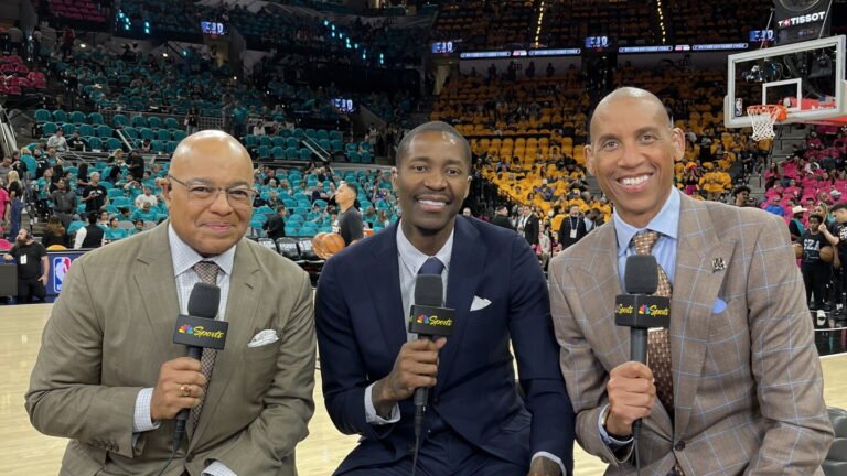 Mike Tirico, Jamal Crawford and Reggie Miller holding NBC Sports microphones at courtside