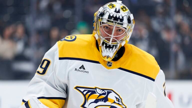 Justus Annunen wearing a Nashville Predators jersey and goaltender mask.