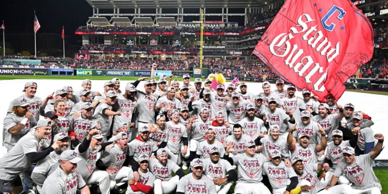 Cleveland Guardians players celebrate their ALDS victory.
