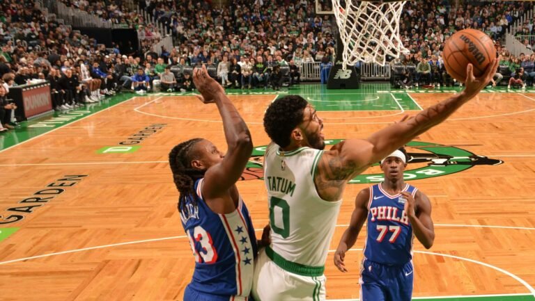 Jayson Tatum attempts a layup against Philadelphia.