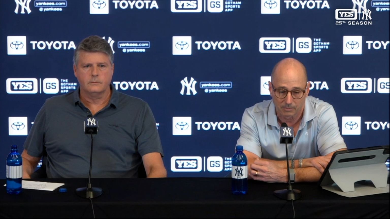 Hal Steinbrenner, left, and Brian Cashman sit at the Yankees’ end-of-season press conference.