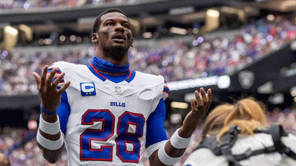 Sam Franklin Jr., wearing Buffalo’s number 28 jersey, raises his hands during pregame introductions in Las Vegas.