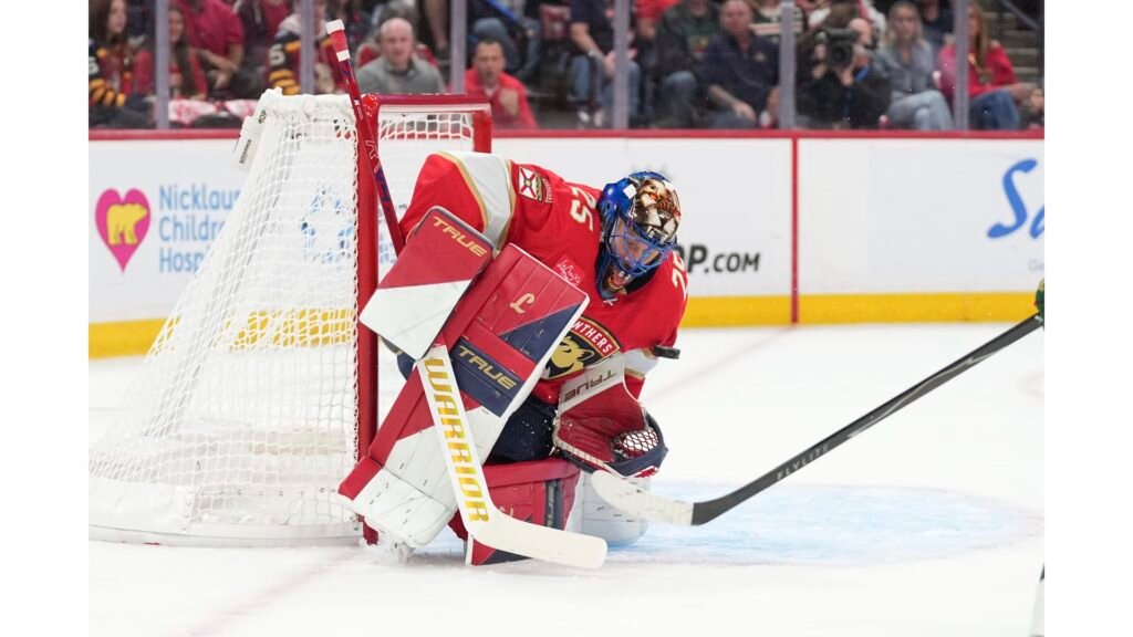 Jacob Markstrom, wearing Florida’s number 25, guards the net against Minnesota.