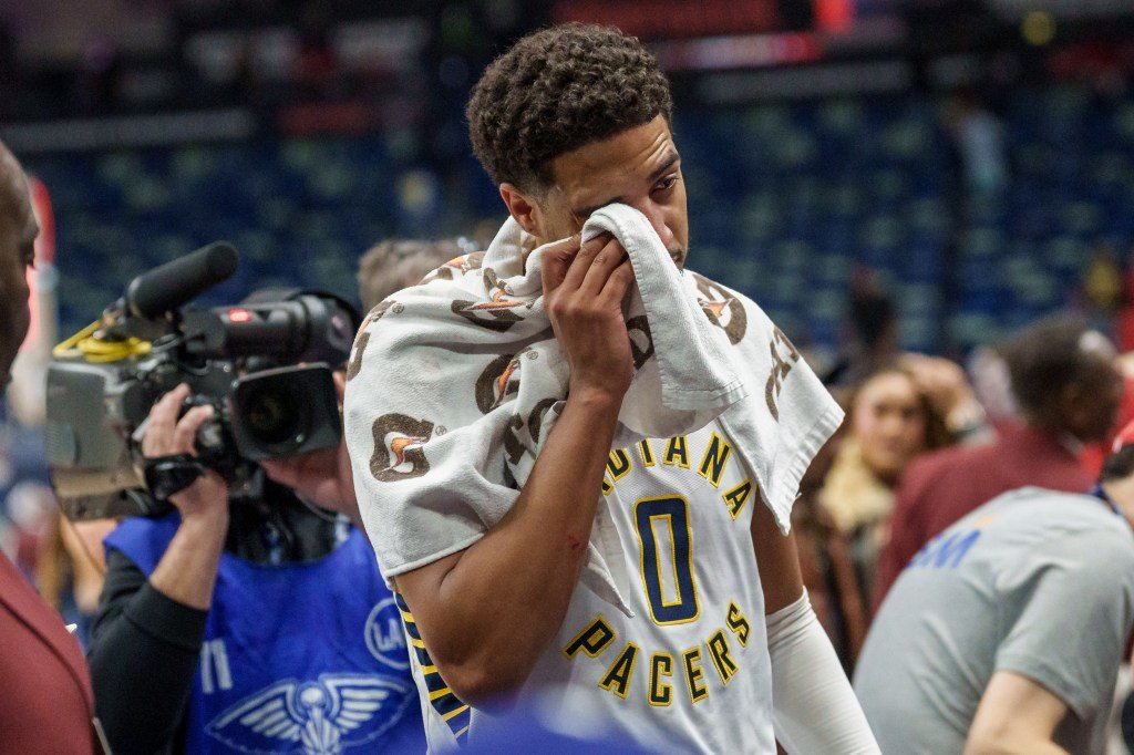 Tyrese Haliburton wipes his eye after the Pacers’ season-opening win in New Orleans on October 21, 2026.