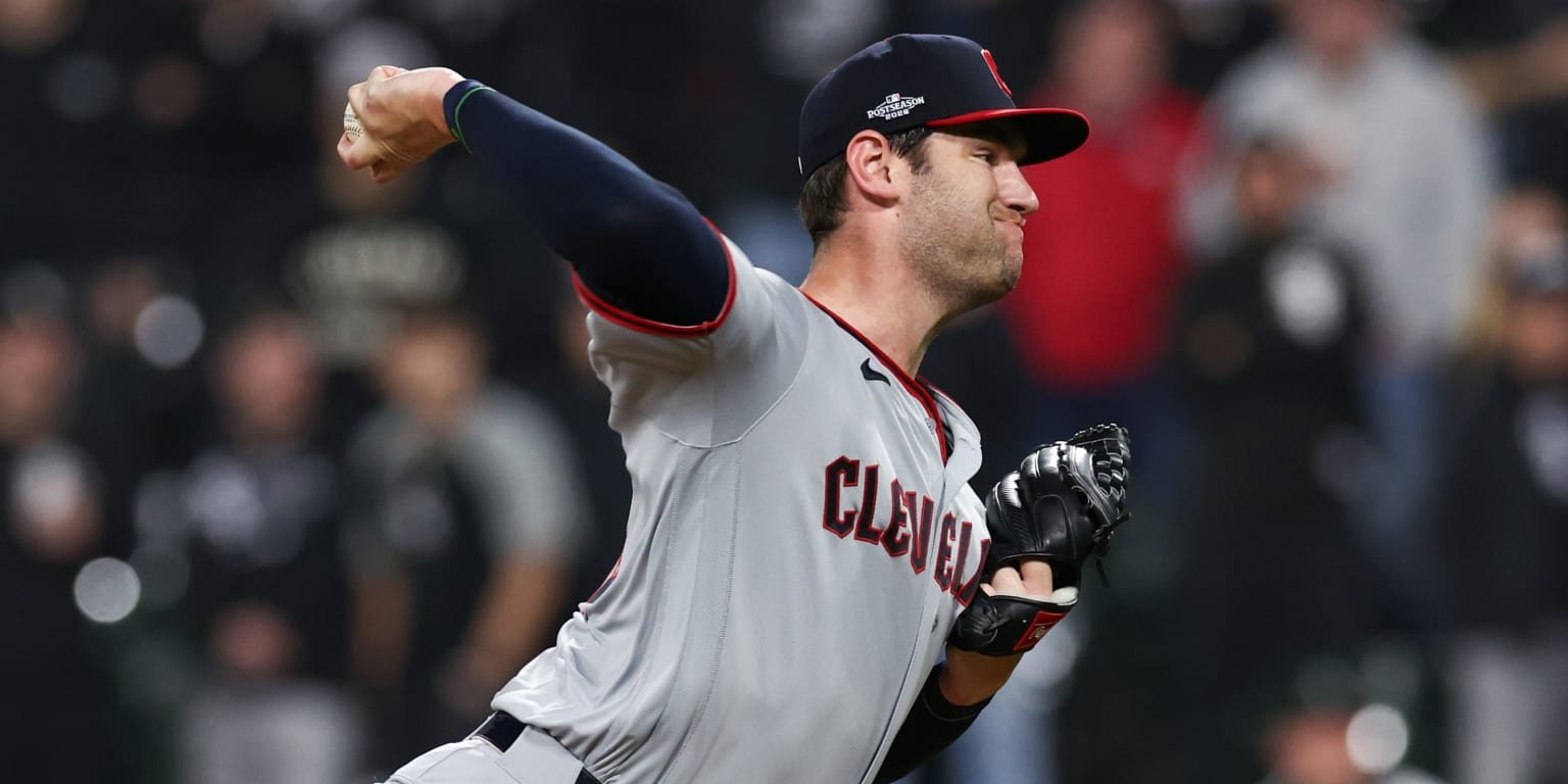 Gavin Williams delivers a pitch in a gray Cleveland Guardians uniform.