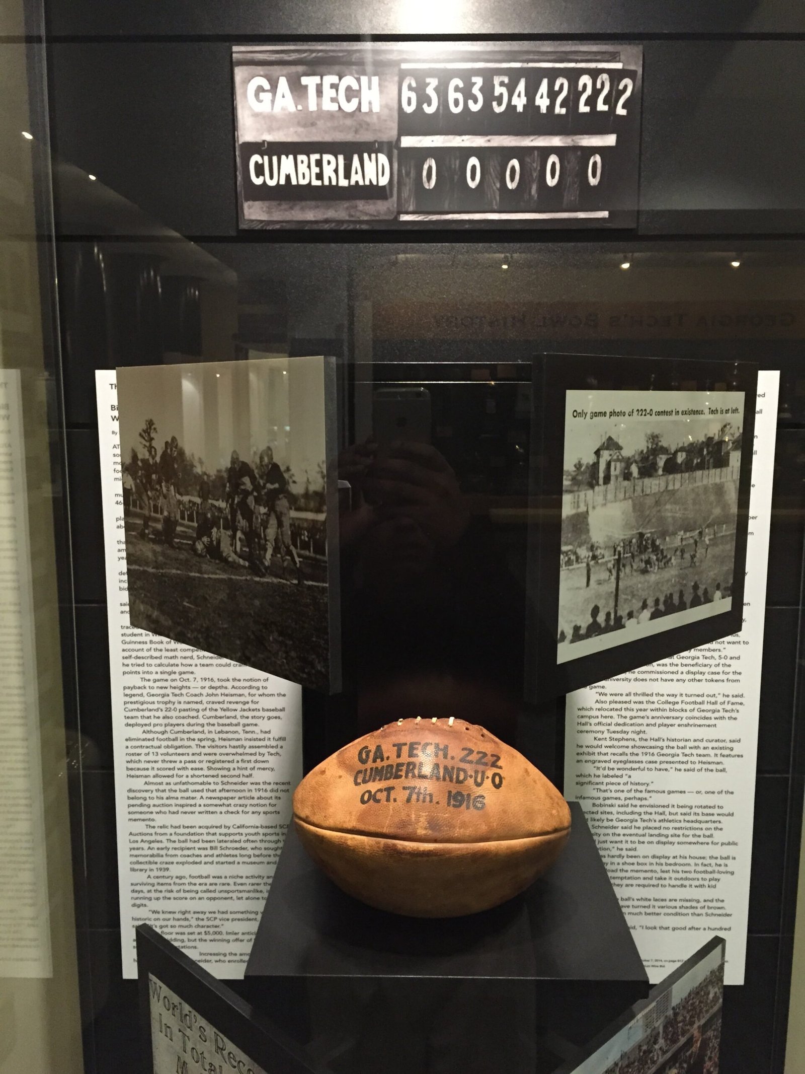 The game ball from Georgia Tech’s 222–0 win in a display case