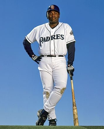 Tony Gwynn standing with a bat in a Padres uniform