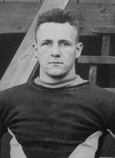 Everett Strupper in an archival football portrait