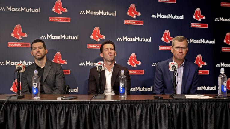 Chad Tracy, Craig Breslow and Sam Kennedy seated at the Red Sox end-of-season press conference.