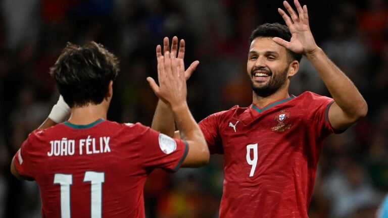 Gonçalo Ramos and João Félix celebrate in Portugal jerseys.