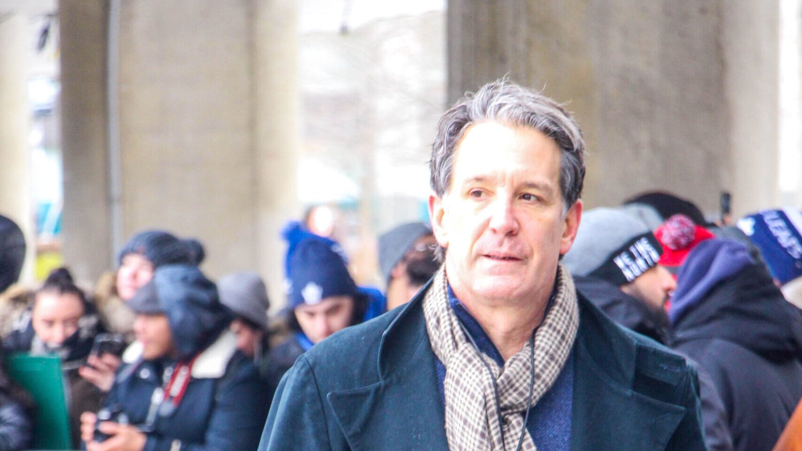 Brendan Shanahan wearing a dark coat at a Toronto Maple Leafs outdoor practice.