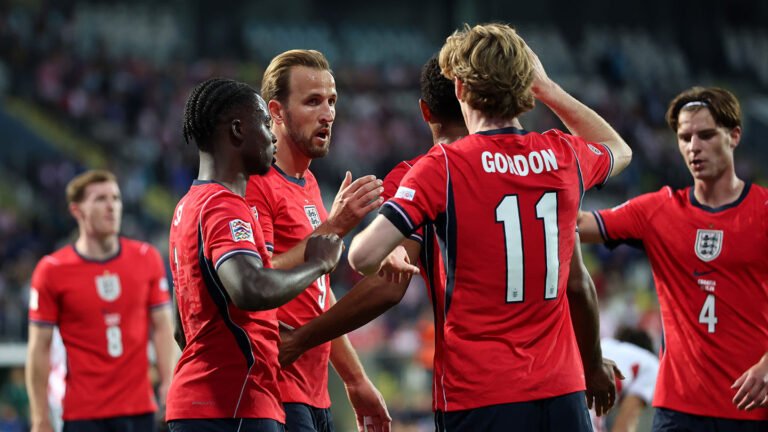 Bukayo Saka celebrates with England teammates against Croatia.