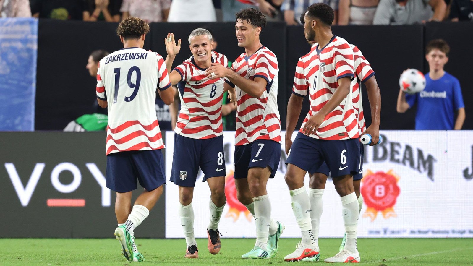 United States players celebrate a goal against Mexico in Glendale.
