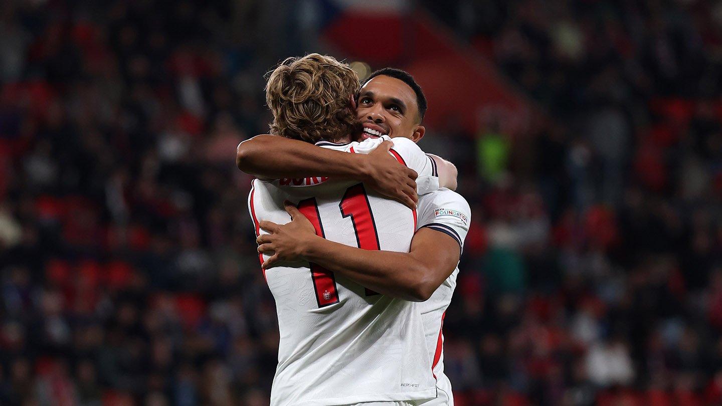 Anthony Gordon celebrates with Trent Alexander-Arnold after scoring against Czechia in Prague on September 29, 2026.
