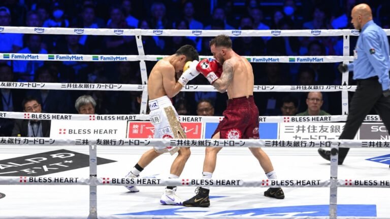 Sam Goodman and Ryosuke Nishida exchanging punches in Tokyo.