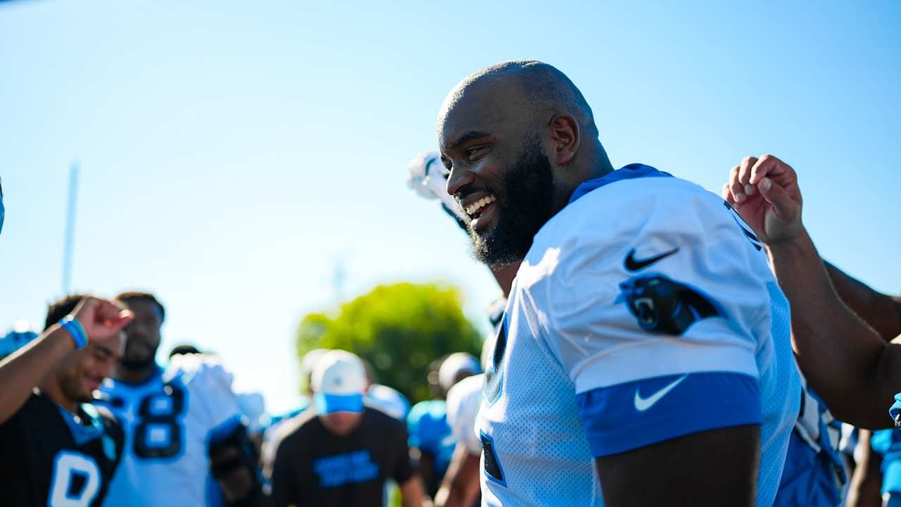 Taylor Moton smiles at Carolina Panthers practice on October 13, 2026.