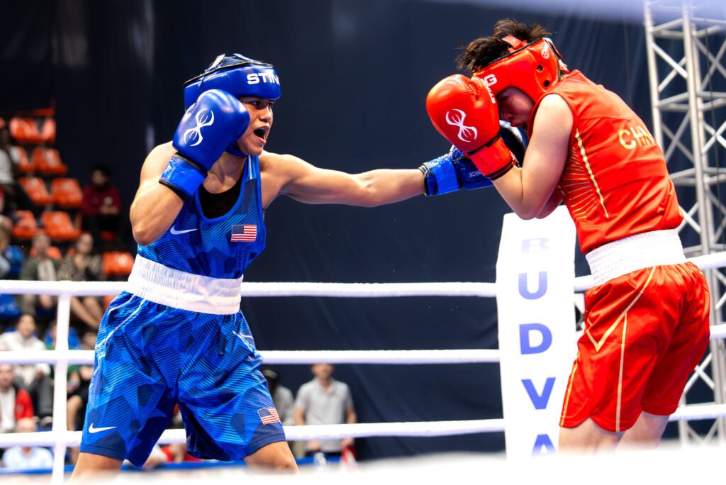 A U.S. boxer faces a Chinese opponent at the 2026 World Boxing U19 Championships in Budva. Earlier tournament action.