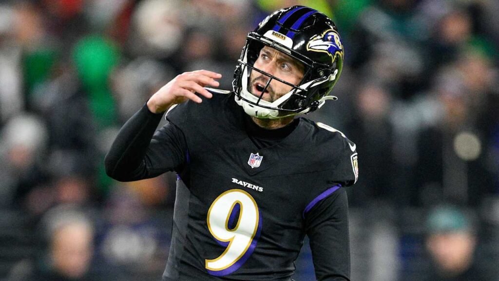 Justin Tucker wearing Baltimore’s purple number 9 jersey.