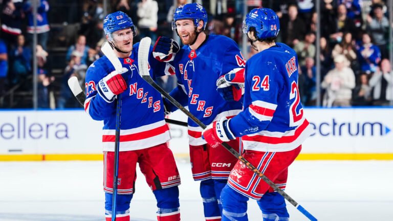 Vladislav Gavrikov stands between Rangers teammates in the official October 4 Utah–New York goal-highlight poster.
