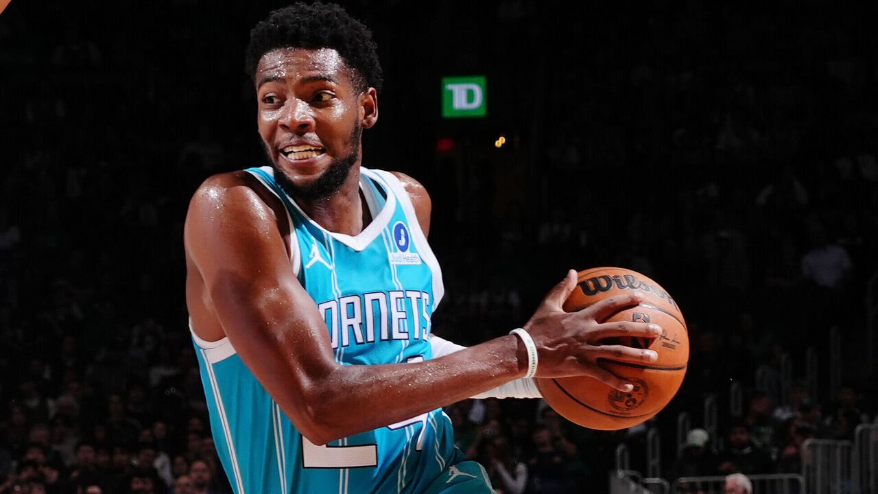 Brandon Miller of the Charlotte Hornets drives against the Boston Celtics.