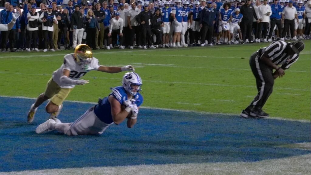 Walker Lyons dives to secure BYU’s winning touchdown catch against Notre Dame in Provo.